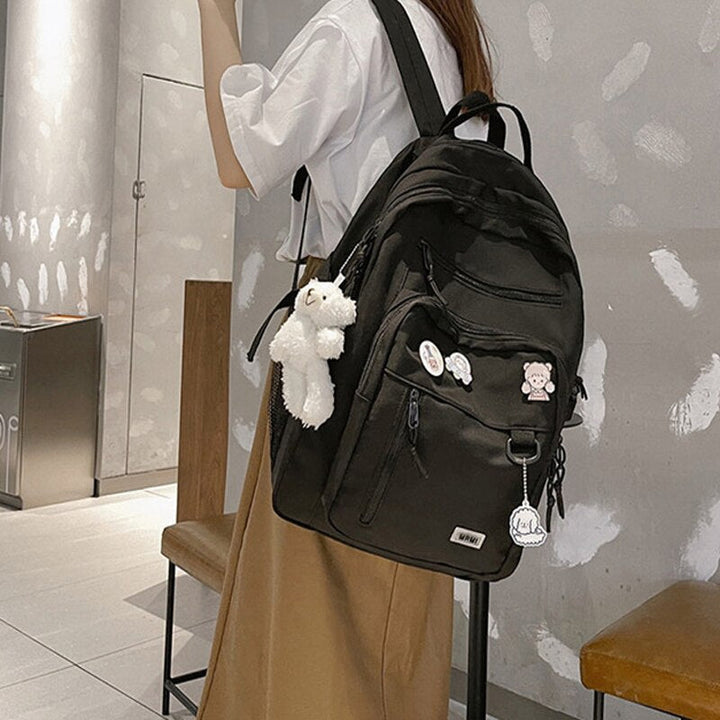 Spacious School Backpack – With Stylish Pins and Keychain 2