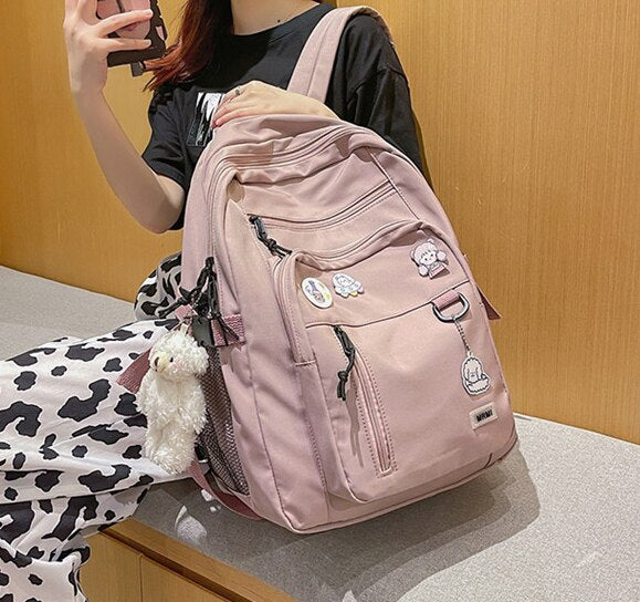 Spacious School Backpack – With Stylish Pins and Keychain 3
