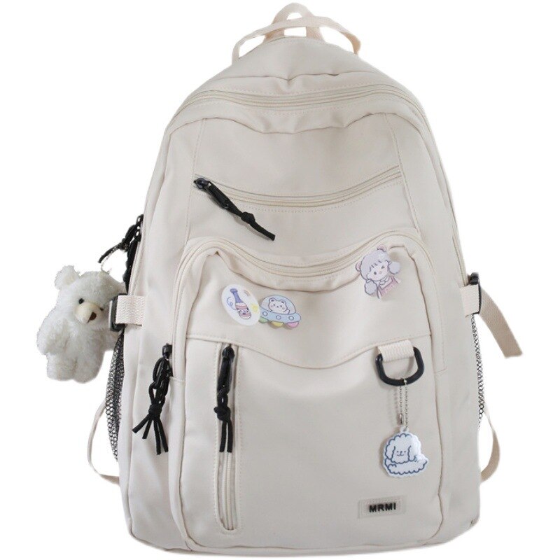 Spacious School Backpack – With Stylish Pins and Keychain 5