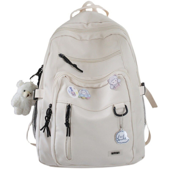 Spacious School Backpack – With Stylish Pins and Keychain 5