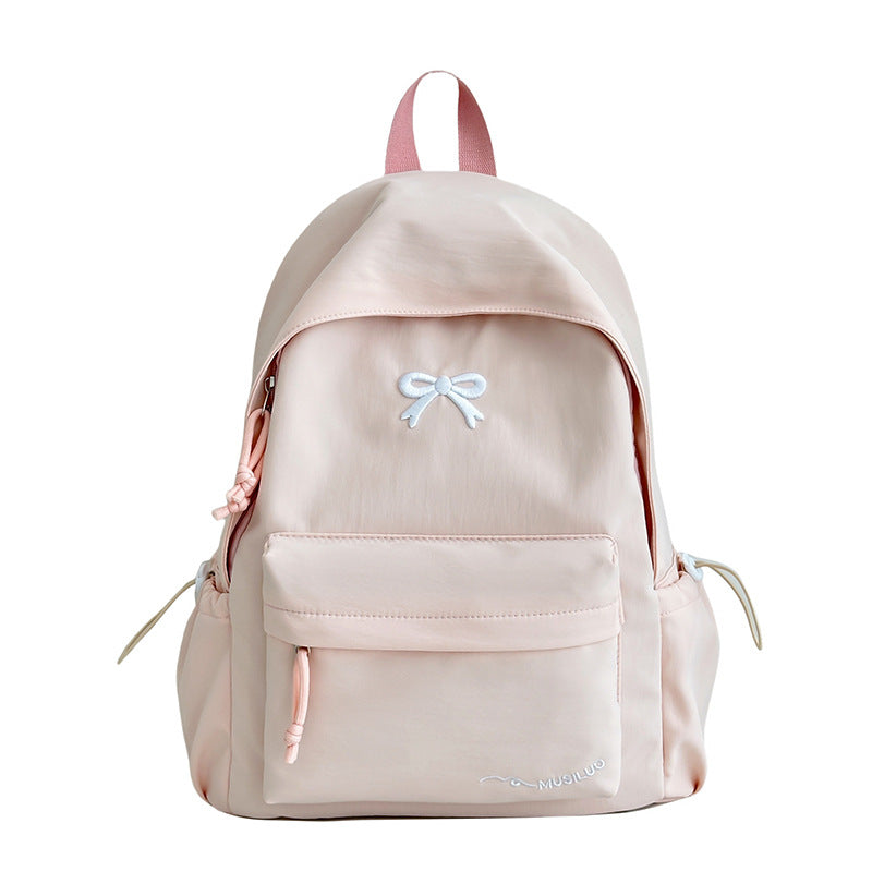 Women's Casual School Backpack – Functional and Stylish Accessory with Bow Embossing 1