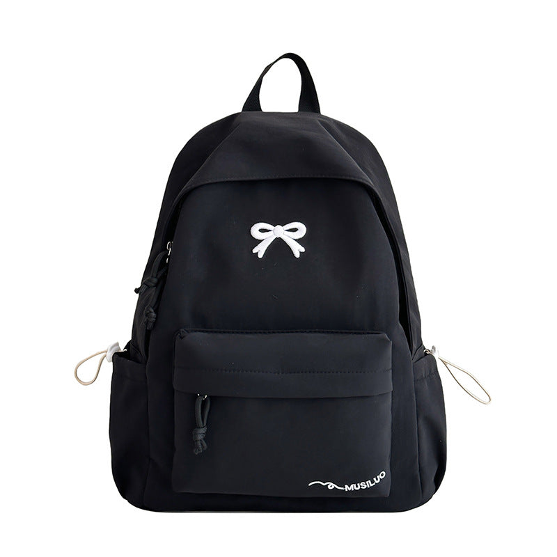 Women's Casual School Backpack – Functional and Stylish Accessory with Bow Embossing 4