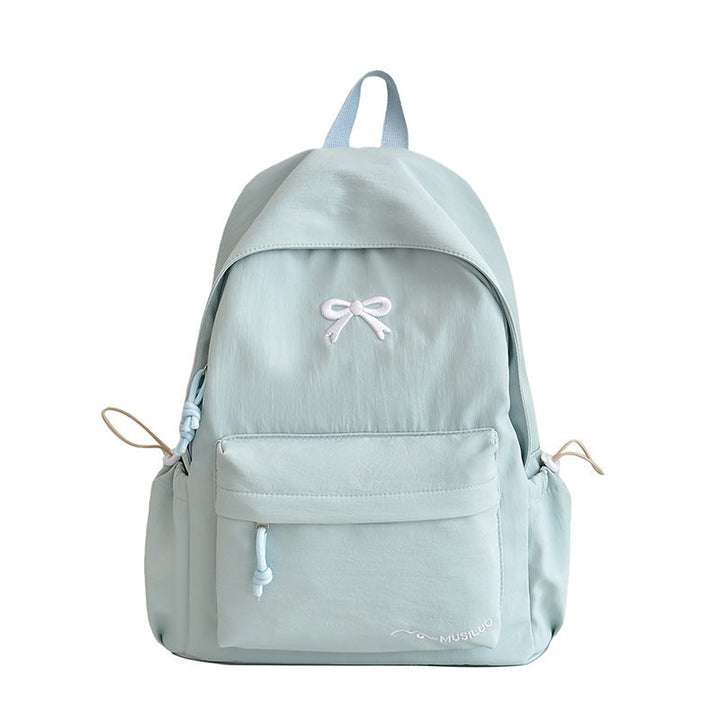 Women's Casual School Backpack – Functional and Stylish Accessory with Bow Embossing 5
